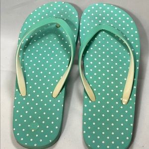 Good condition turquoise flip flops